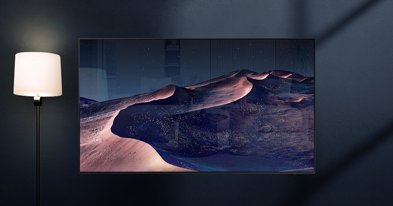 A TV displays a scene of a desert in a starry night. A nearby lamp throws distracting reflections on the screen. With glare-free technology, the screen becomes clear. UL Verified Logo. Glare Free: Reflection Glare UGR < 10, Discomfort Glare < UGR 22, Disability Glare < 34. verifyUL.com®. V166045.